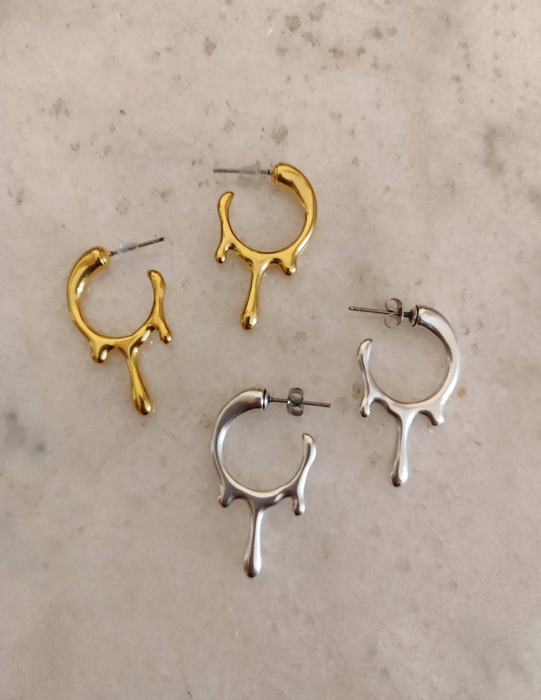 Σκουλαρίκια λιωμένοι κρίκοι!